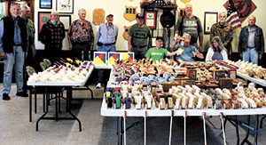 Rutherford County Woodworkers members behind tables of handmade wooden toys at the Marine Corps League in Forest City, October 2026.